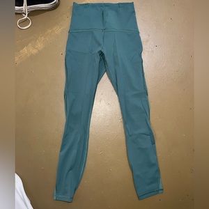 Lulu lemon leggings with mesh details on the legs, green, size 4